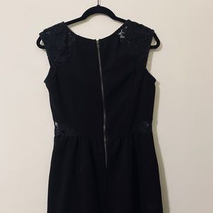 Little black dress with lace cutouts